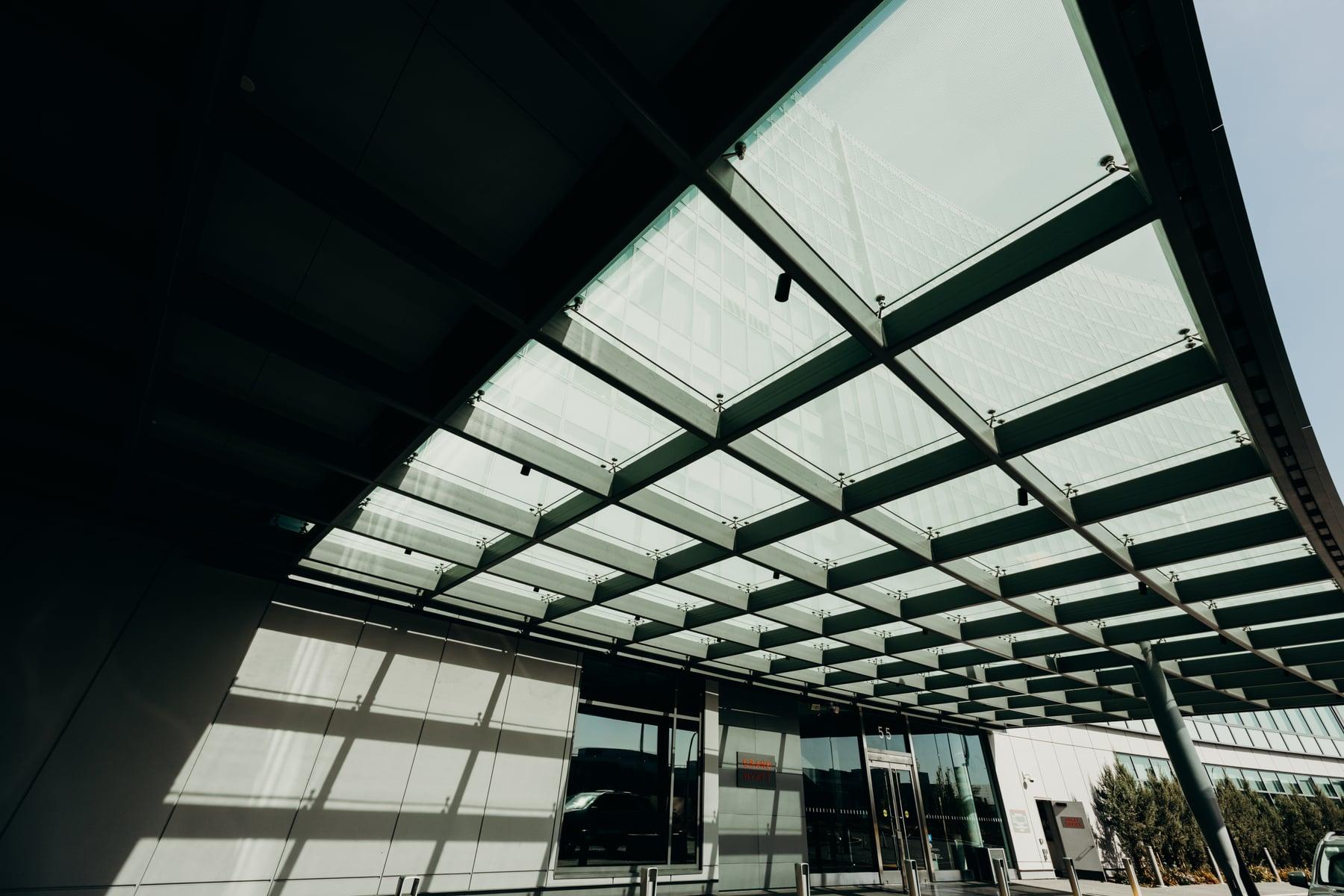 Framed glass canopy over the entrance at the Grand Hyatt San Francisco, seen from below