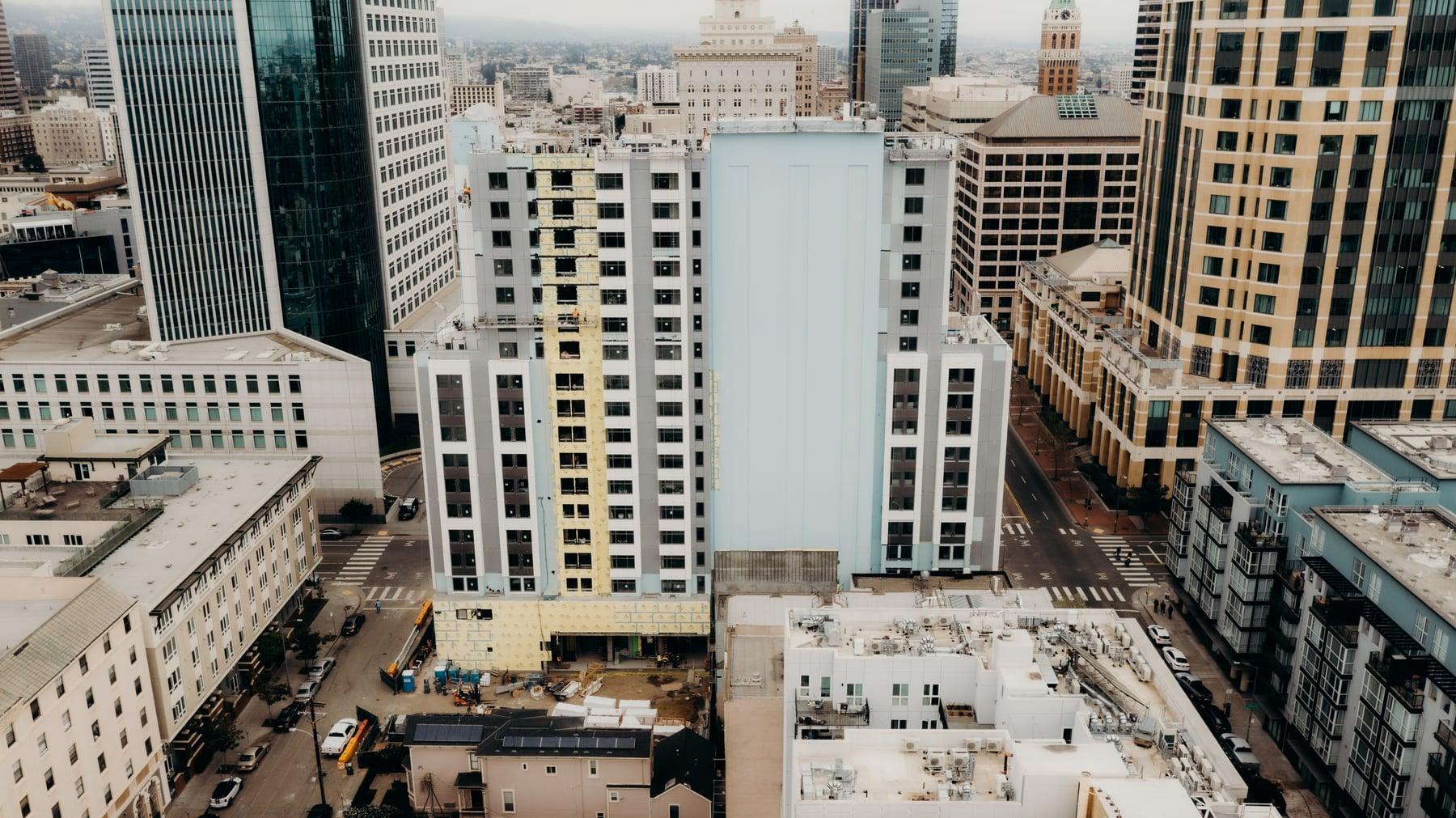 Aerial view of the hotel tower among downtown Oakland buildings